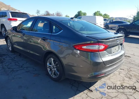 2016 Ford Fusion Hybrid Se z USA, uszkodzony, nr VIN 3FA6P0LU9GR398815